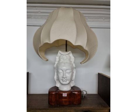 A pottery Guanyin adjustable table lamp,&nbsp;with elaborate shade, approx 80cm high.