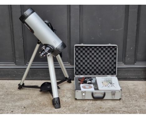A Celestron 114LCM telescope,&nbsp;with instruction manual and related.