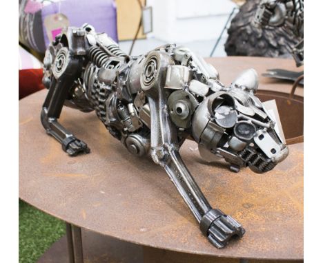 ENGINE PART SCULPTURE, of a panther, 66cm L x 21cm H.