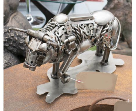 ENGINE PART SCULPTURE, of a bull, 47cm L x 23cm H.