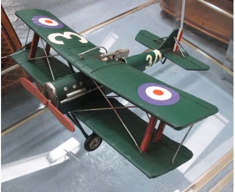 BRITISH WARTIME BI-PLANE MODEL, tin plate with authentic detail and markings, 23cm H x 58cm W x 48cm L.