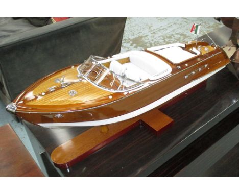 MODEL MOTOR BOAT, in wood on stand, 67cm L.