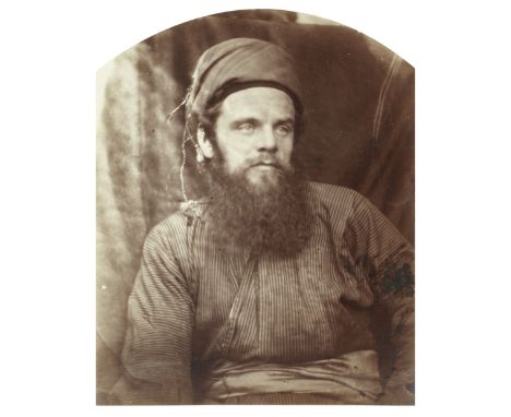 CAMERON (JULIA MARGARET)William Holman Hunt, half length portrait,  albumen print, mounted on card, captioned in ink 'Registe