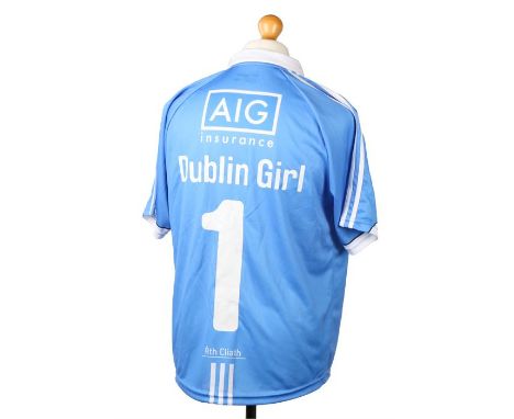 Ed Sheeran's Dublin City Hurling top, in blue with badge to breast, the back Dublin Girl 1, size M. All of the Ed Sheeran Col