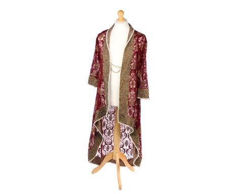 Ed Sheeran's jacket, in red with gilt swags and faux pearl decoration . All of the Ed Sheeran Collection has come from Ed She