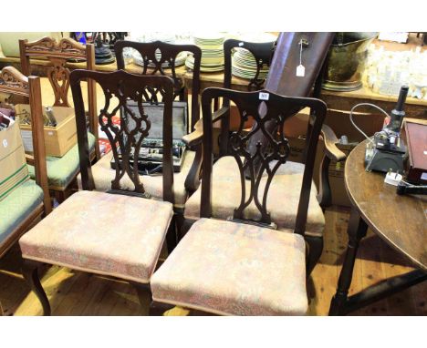 Set of four mahogany Chippendale style dining chairs (three single and one carver)