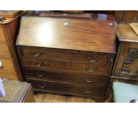 Georgian mahogany four drawer bureau on bracket feet