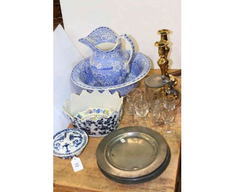 Six antique pewter plates with touch marks, early blue and white jug and basin, brass candlesticks, glasses, tankard, etc