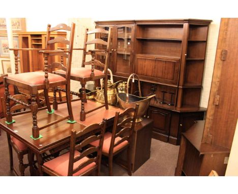 Oak draw leaf dining table and six ladder back chairs and sectional mahogany wall unit