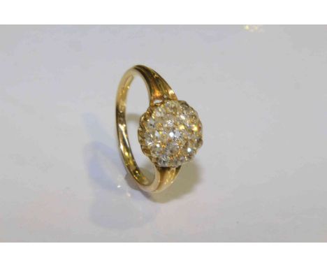 Continental diamond cluster ring, probably 18 carat gold, ring size K