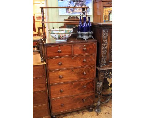 Slim Victorian mahogany chest of two short above four long drawers with raised open shelf back