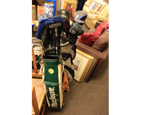 Two golf bags and collection of MacGregor golf clubs, collection of golf balls, pair limited edition golfing prints and frame