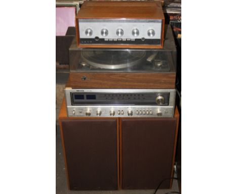 A VINTAGE SANSUI SR212 TURNTABLE, a Nikko 7075 tuner/amplifier, a Leak Stereo 70 amplifier, a pair of Sansui headphone and a 