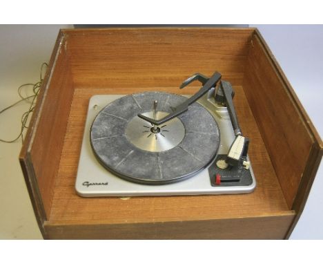 A VINTAGE GARRARD TURNTABLE, in a teak case with smoked perspex lid, the only identifying marks on this item is the Garrard o