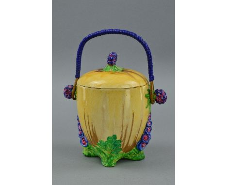 A CLARICE CLIFF 'MY GARDEN' BISCUIT BARREL, shape 673, circa 1934, of tapering ovoid form with moulded leaf and flower decora