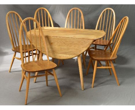 AN ERCOL BLONDE DROP-LEAF TABLE, with rounded leaves to form an oval, approximate size length 116cm x depth 114cm x height 70