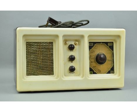 A VINTAGE RADIO RENTALS, LONDON, model RR57, cream and brown bakelite radio, approximate size width 51cm x depth 24cm x heigh