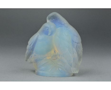 A JOBLINGS OPALIQUE GLASS ORNAMENT OF A PAIR OF BIRDS ON A BRANCH, moulded in opalescent glass inscribed to the base Joblings