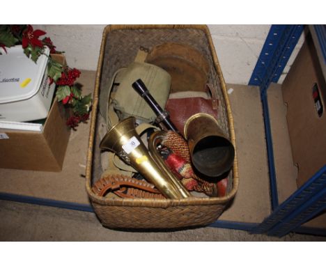 A quantity of military items including a brass bugle, shell case, etc.