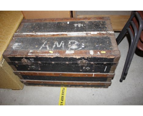 A wooden and metal bound trunk