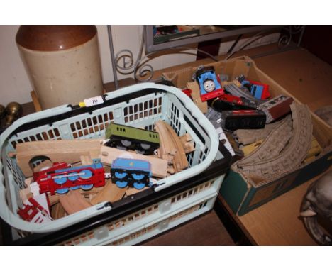 A quantity of Thomas the Tank Engine wooden track and trains, and plastic similar