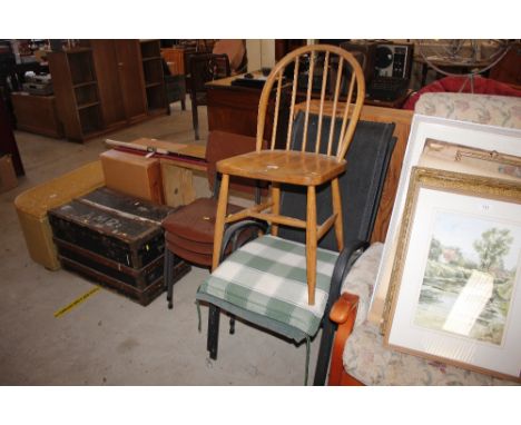 Two garden chairs and cushions; together with a stick back chair and three stacking chairs