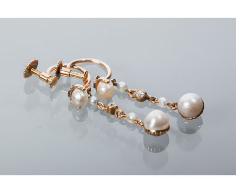 PAIR OF EARLY TWENTIETH CENTURY PEARL AND DIAMOND DROP EARRINGS
each set with a row of four pearls and a single brilliant cut