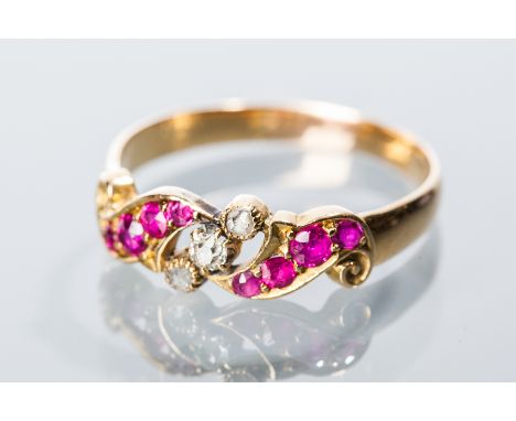 VICTORIAN RUBY AND DIAMOND RING
set with alternating rows of rubies and diamonds, hallmarked eighteen carat gold, size P-Q