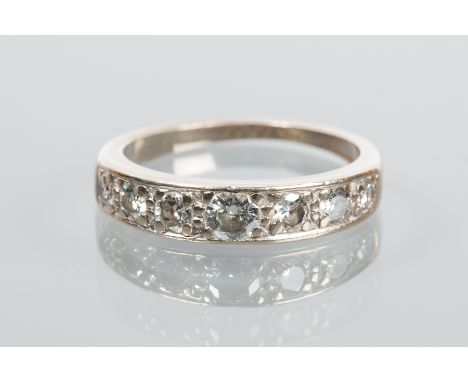 DIAMOND HALF ETERNITY RING
the brilliant cut diamonds totalling approximately 0.60 carats, marked 18c for eighteen carat gold