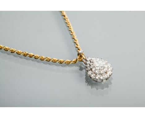 PEAR SHAPED DIAMOND CLUSTER PENDANT
the central pearl cut diamond approximately 0.70 carats, surrounded by brilliant cut diam