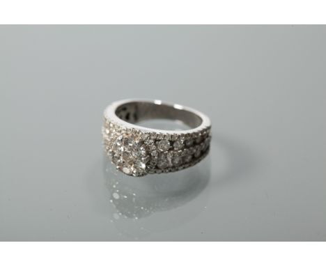 DIAMOND CLUSTER RING
of pierced design, set with brilliant cut diamonds totalling approximately 2.0 carats, unmarked, probabl