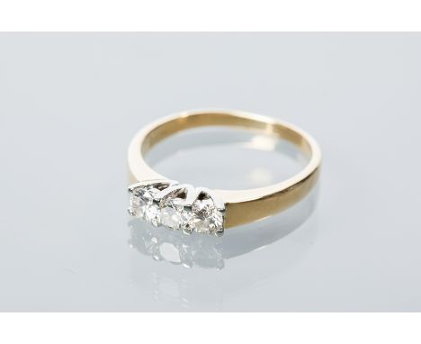 DIAMOND THREE STONE RING
the brilliant cut diamonds each approximately 0.17 carats, in eighteen carat gold, size O