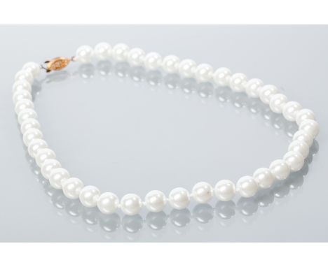 CULTURED PEARL NECKLACE
the spherical white pearls each approximately 10mm diameter, 46cm long