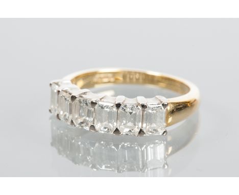 DIAMOND SIX STONE RING
set with a row of six emerald cut diamonds totalling approximately 1.60 carats, hallmarked for eightee