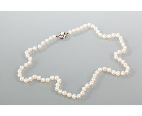 SINGLE STRAND PEARL NECKLACE
set with spherical pearls each approximately 5.82mm diameter, the pearl set clasp marked sterlin