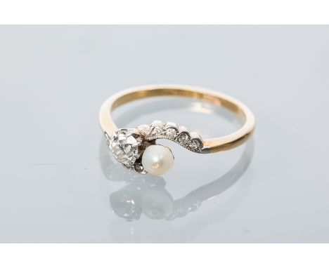 PEARL AND DIAMOND RING
set with a brilliant cut diamond and spherical pearl in a crossover setting, the diamond approximately