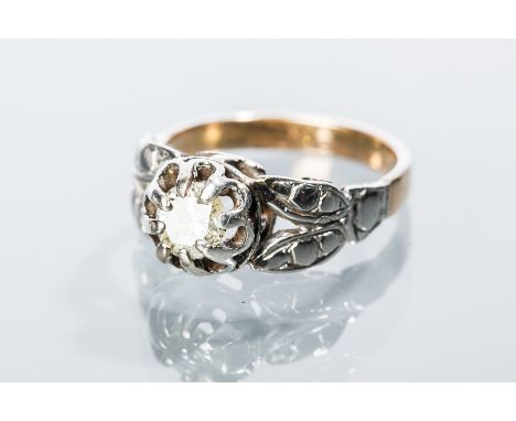UNUSUAL DIAMOND SOLITAIRE RING
the central brilliant cut diamond approximately 0.40 carats, on bifurcated foliate shoulders, 