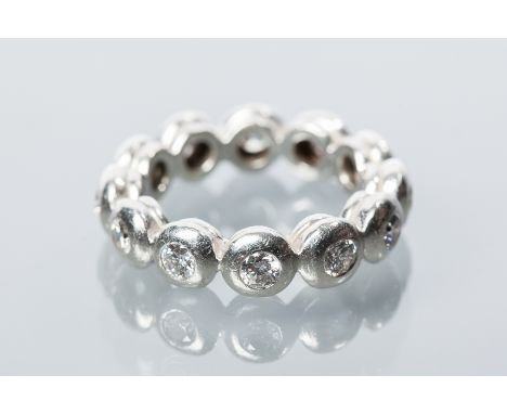 DIAMOND FULL ETERNITY RING BY GARRARD &amp; CO set with brilliant cut diamonds totalling 1.2 carats, in eighteen carat white 