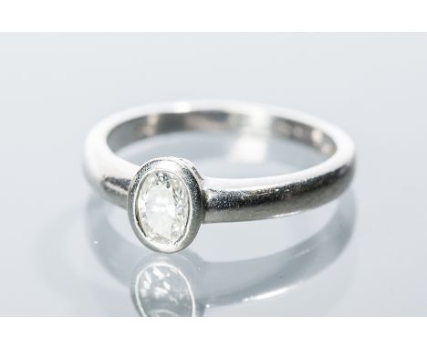 DIAMOND SOLITAIRE RING
the oval cut diamond of approximately 0.45 carats, in platinum, size L-M