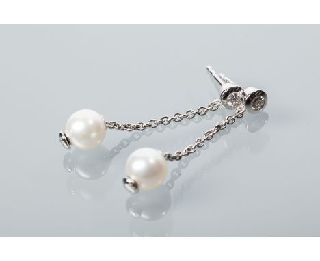 PAIR OF MIKIMOTO PEARL AND DIAMOND EARRINGS
each with a single pearl measuring 7.11mm diameter, suspended on a chain below a 