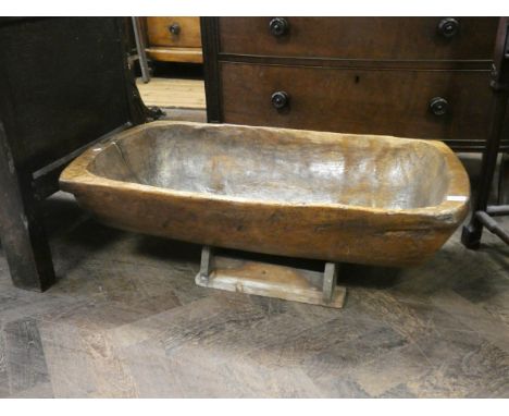 Hewn wooden plant trough or crib on stand, 35" wide 