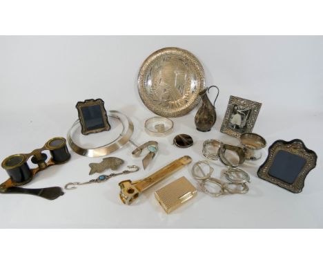 A collection of small silverware to include oriental white metal dish, hallmarked silver napkin rings, miniature photograph f