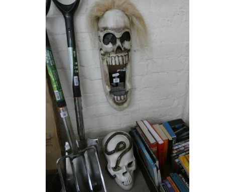 Unusual small mirror with skull surround and skull (which can be illuminated by candle) with snake wrapped round