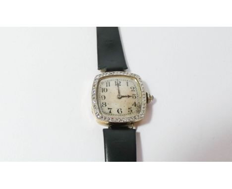 Art Deco ladies vintage wristwatch with square dial and diamond bezel on 9ct case