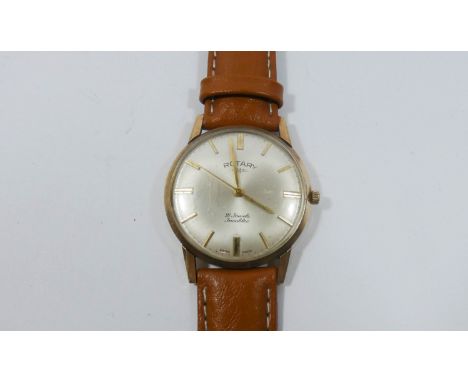 Gents vintage 9ct gold Rotary wristwatch, on brown leather strap  Watch running at time of inspection