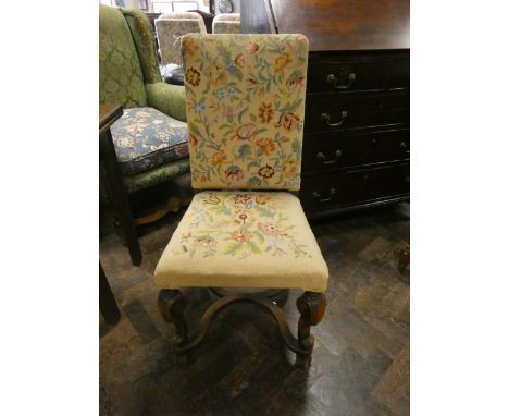 A tapestry upholstered dining chair on carved walnut base with cross stretchers 