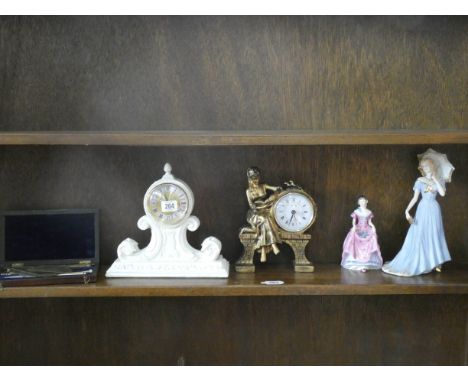 A set of drawing instruments, gilt figure clock, white clock and two figure ornaments 