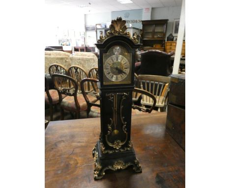 A miniature Grandfather clock in black lacquered style and gilt decorated case 13" high overall 