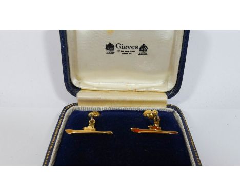 A pair of unusual 9ct gold vintage earrings with submarine motifs in original Gieves &amp; Hawkes box, stamped 9ct, 2cms acro