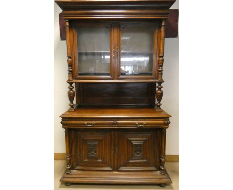 A French oak buffet cabinet with glazed display cabinet back standing on drawer and cupboard base with fielded panels, 55" wi